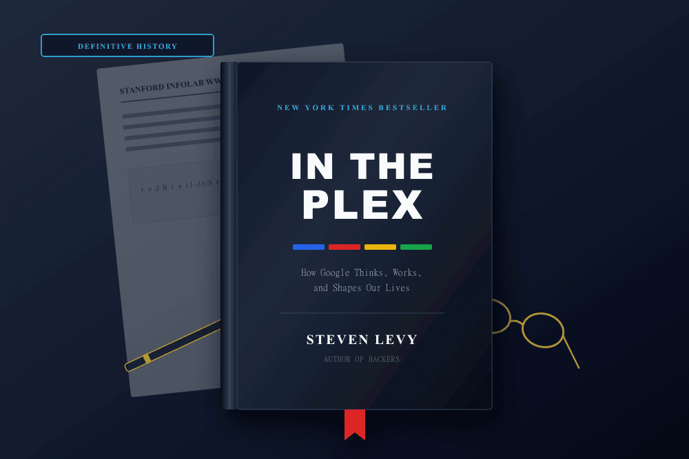 Editorial presentation of Steven Levy's historical study In the Plex on an oak desk beside early internet research printouts and reading glasses.